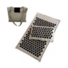 charcoal black linen acupressure mat with matching pillow laid flat, showing dense pressure points for relaxation, recovery, and sleep