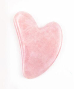 jade gua sha tool curved edge detail for gentle face massage and skincare self-care routines