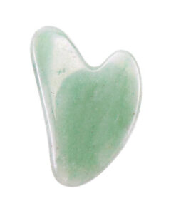 jade gua sha tool handheld beauty accessory for face massage and skincare self-care routines