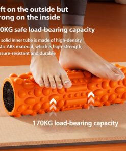 orange vibrating foam roller under both feet showing textured massage surface for lower body recovery balance support and daily mobility use